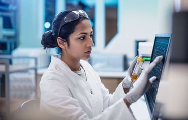 Asian women in Lab using technology