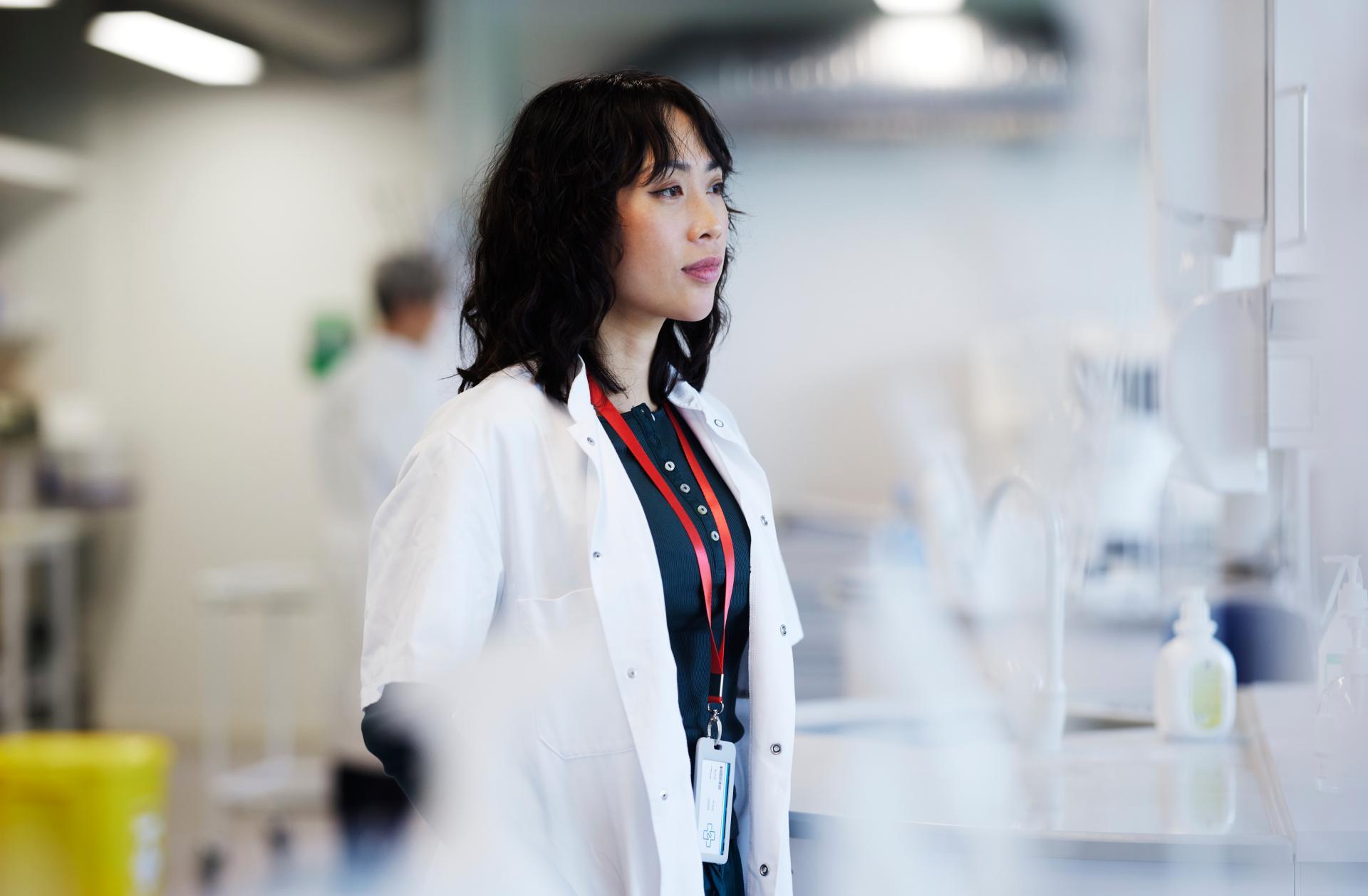 Young female scientist working in laboratory